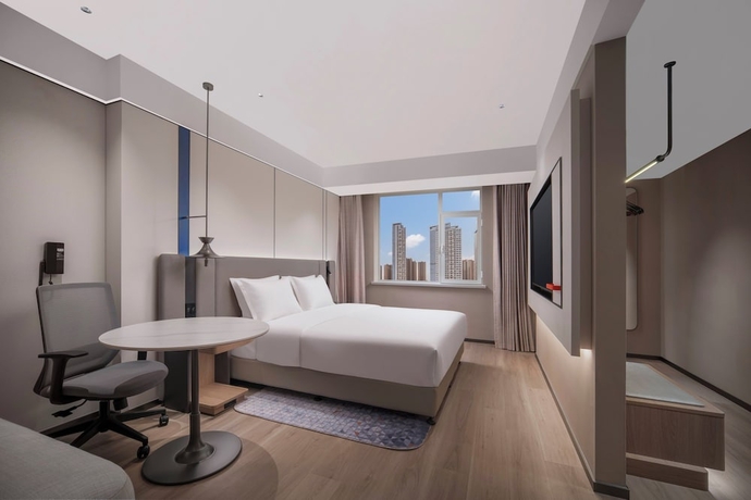 Imagen de la habitación del Hotel Holiday Inn Express Qingdao Downtown by IHG. Foto 14