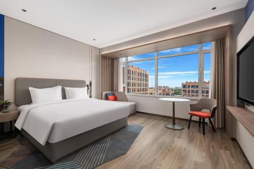 Imagen de la habitación del Hotel Holiday Inn Express Qingdao Hongdao Station, an IHG. Foto 13