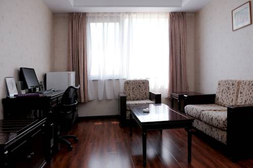 Imagen de la habitación del Hotel Holiday Inn Express Qingdao Shibei by IHG. Foto 5