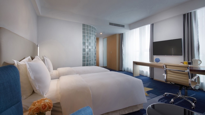 Imagen de la habitación del Hotel Holiday Inn Express Qingdao West Coast, An Ihg. Foto 4