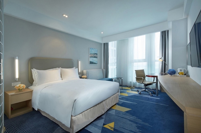 Imagen de la habitación del Hotel Holiday Inn Express Qingdao West Coast, An Ihg. Foto 10
