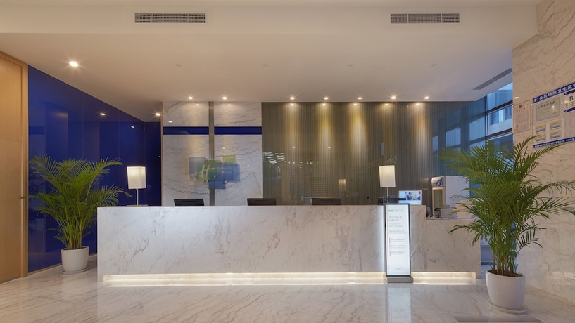 Imagen de los interiores del Hotel Holiday Inn Express Qingdao West Coast, An Ihg. Foto 16