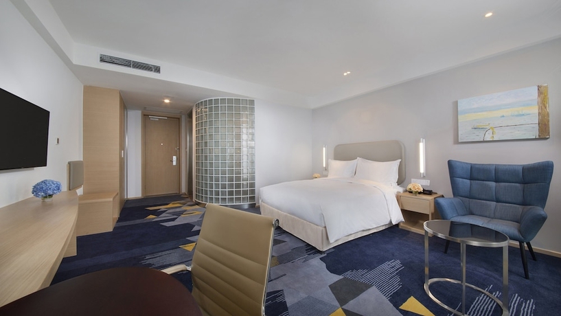 Imagen de la habitación del Hotel Holiday Inn Express Qingdao West Coast, An Ihg. Foto 13