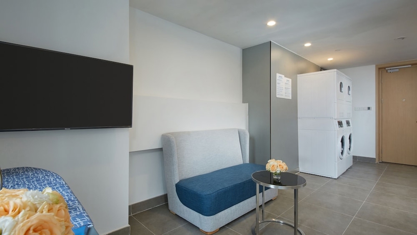 Imagen de los interiores del Hotel Holiday Inn Express Qingdao West Coast, An Ihg. Foto 18