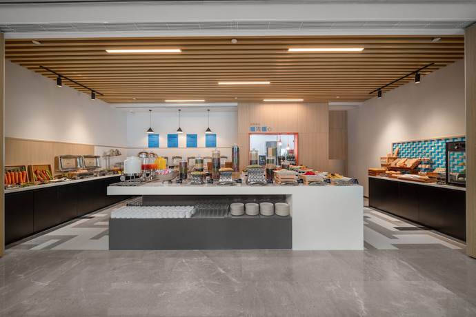 Imagen del bar/restaurante del Hotel Holiday Inn Express Rongcheng Science And Technolo, an IHG. Foto 7