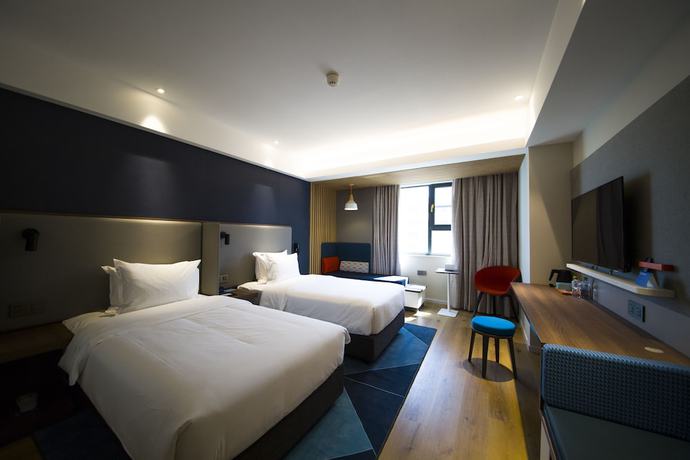 Imagen de la habitación del Hotel Holiday Inn Express Sanya Bay. Foto 3