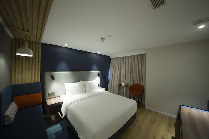 Imagen de la habitación del Hotel Holiday Inn Express Sanya Bay. Foto 4
