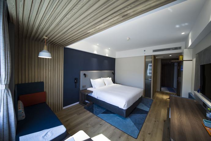 Imagen de la habitación del Hotel Holiday Inn Express Sanya Bay. Foto 8