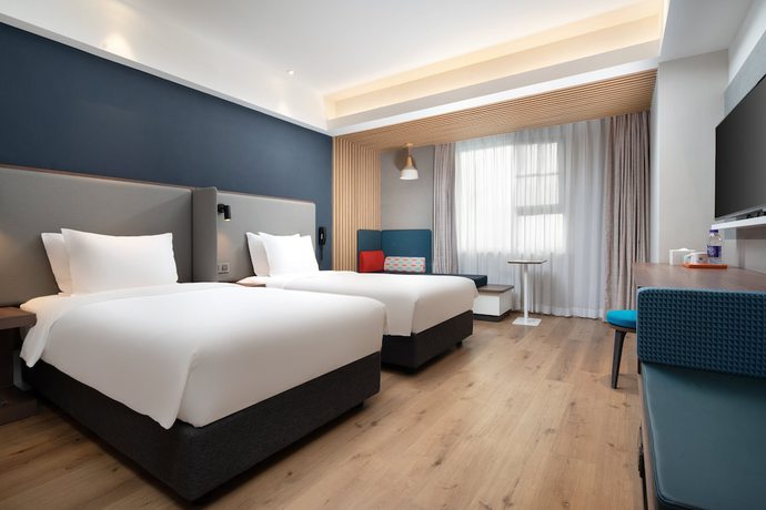 Imagen de la habitación del Hotel Holiday Inn Express Sanya Bay. Foto 9
