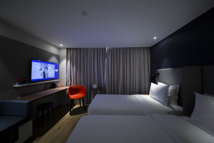 Imagen de la habitación del Hotel Holiday Inn Express Sanya Bay. Foto 12