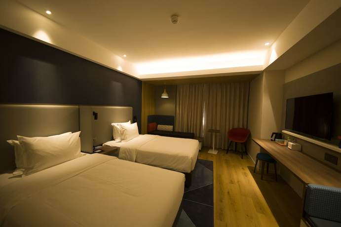 Imagen de la habitación del Hotel Holiday Inn Express Sanya Bay. Foto 17