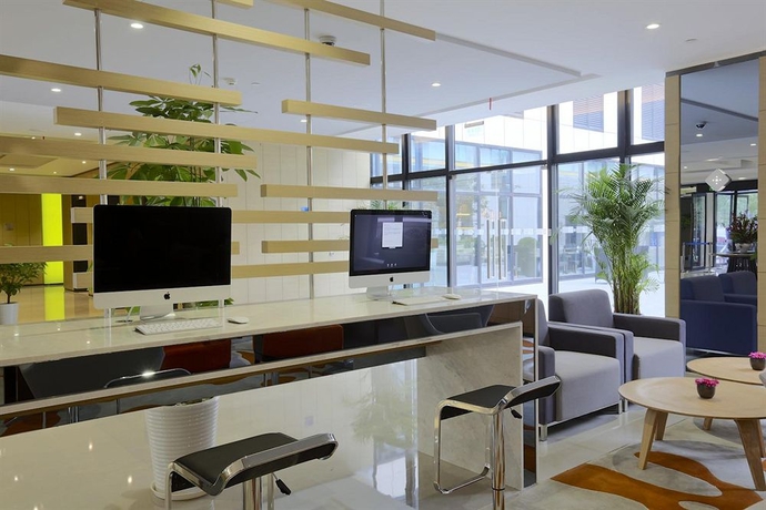 Imagen de los interiores del Hotel Holiday Inn Express Shanghai Gongkang, An Ihg. Foto 15