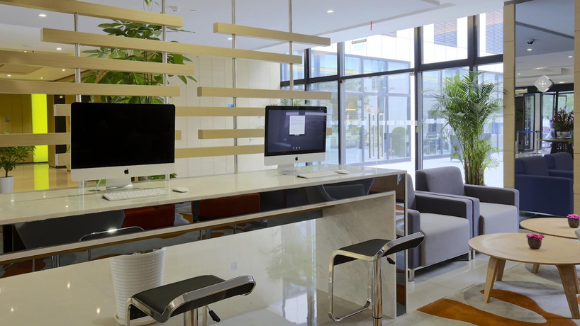 Imagen de los interiores del Hotel Holiday Inn Express Shanghai Gongkang, An Ihg. Foto 16