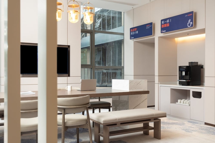 Imagen de los interiores del Hotel Holiday Inn Express Shanghai Gumei, an IHG. Foto 18