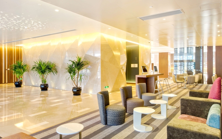 Imagen de los interiores del Hotel Holiday Inn Express Shanghai Jinsha. Foto 9