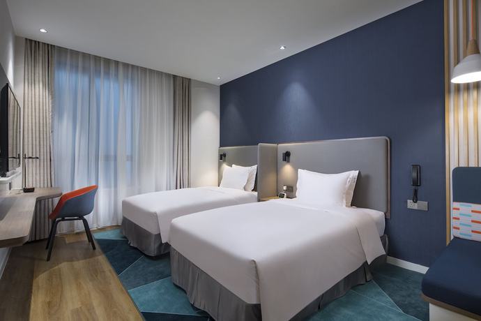 Imagen de la habitación del Hotel Holiday Inn Express Shanghai Kangqiao. Foto 3