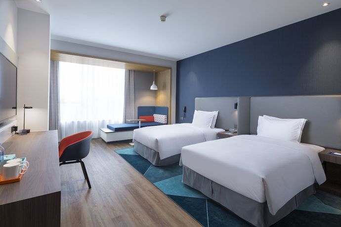 Imagen de la habitación del Hotel Holiday Inn Express Shanghai Kangqiao. Foto 4