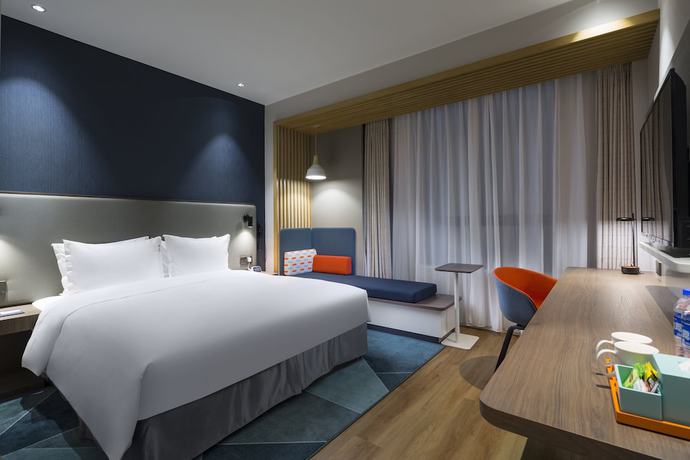 Imagen de la habitación del Hotel Holiday Inn Express Shanghai Kangqiao. Foto 8