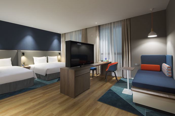 Imagen de la habitación del Hotel Holiday Inn Express Shanghai Kangqiao. Foto 12