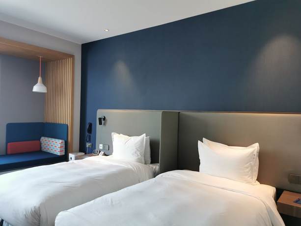 Imagen de la habitación del Hotel Holiday Inn Express Shanghai Kangqiao. Foto 15