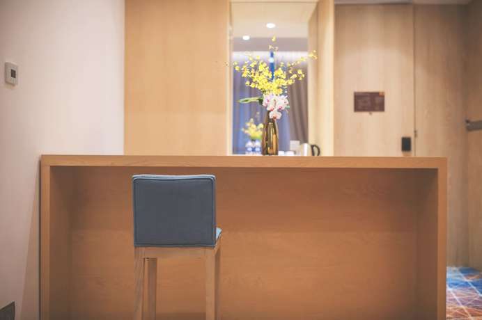 Imagen de la habitación del Hotel Holiday Inn Express Shanghai Songjiang Fangta. Foto 5