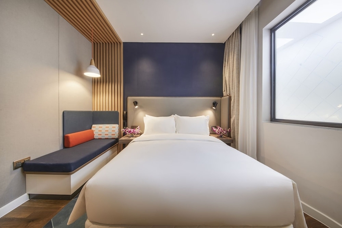 Imagen de la habitación del Hotel Holiday Inn Express Shanghai Xuhui Binjiang. Foto 9