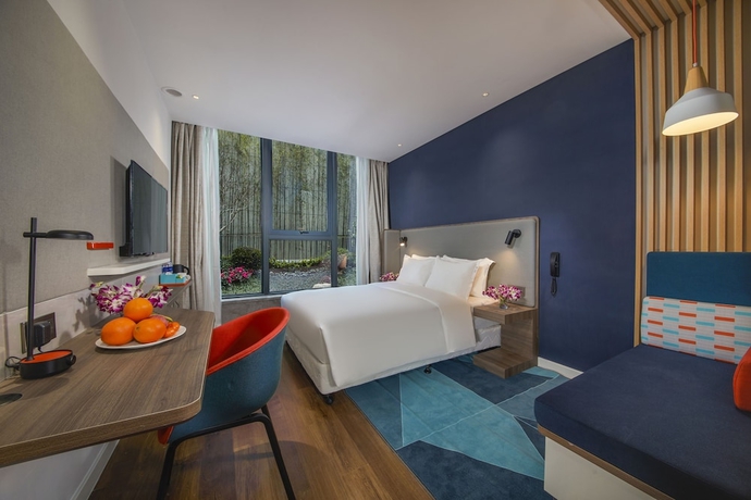 Imagen de la habitación del Hotel Holiday Inn Express Shanghai Xuhui Binjiang. Foto 11