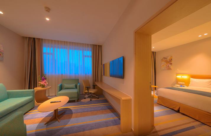 Imagen del bar/restaurante del Hotel Holiday Inn Express Shanghai Zhenping, An Ihg. Foto 5