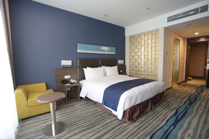 Imagen de los interiores del Hotel Holiday Inn Express Shenyang North Station. Foto 19