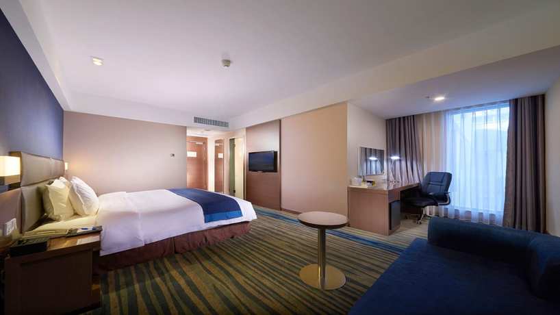 Imagen de la habitación del Hotel Holiday Inn Express Shenyang North Station. Foto 17
