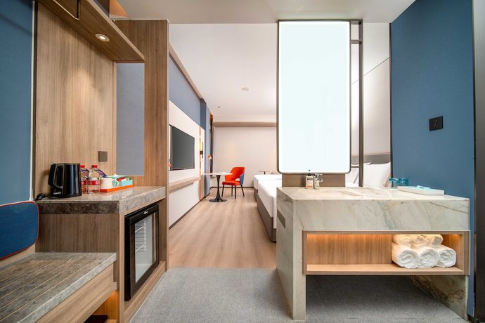 Imagen de la habitación del Hotel Holiday Inn Express Suzhou Shihu University Town. Foto 12