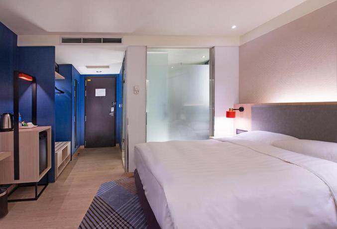 Imagen de la habitación del Hotel Holiday Inn Express Taipei Train Station by IHG. Foto 5