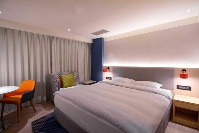 Imagen de la habitación del Hotel Holiday Inn Express Taipei Train Station by IHG. Foto 8