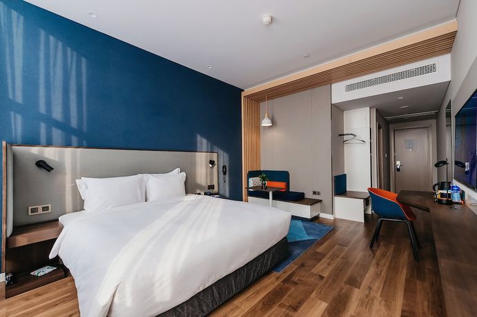 Imagen de la habitación del Hotel Holiday Inn Express Taizhou CMC. Foto 11