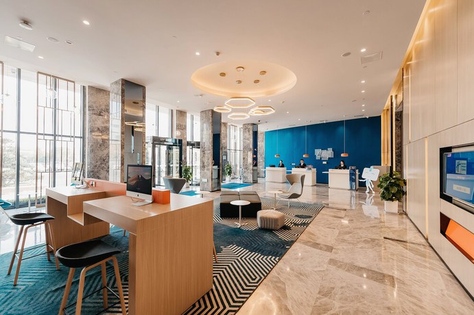 Imagen de los interiores del Hotel Holiday Inn Express Taizhou CMC. Foto 16