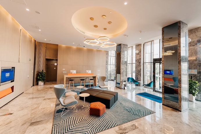 Imagen de los interiores del Hotel Holiday Inn Express Taizhou CMC. Foto 17