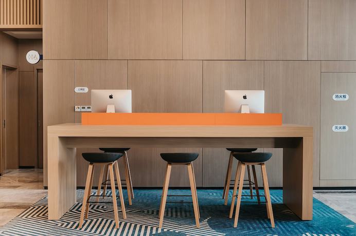 Imagen de los interiores del Hotel Holiday Inn Express Taizhou CMC. Foto 18