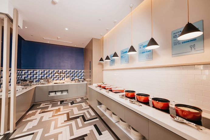 Imagen del bar/restaurante del Hotel Holiday Inn Express Taizhou CMC. Foto 3