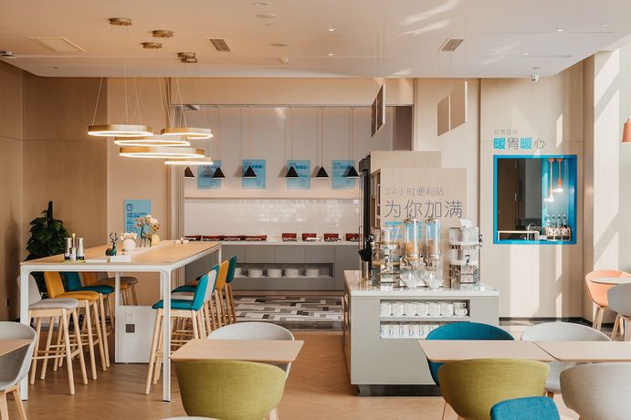 Imagen del bar/restaurante del Hotel Holiday Inn Express Taizhou CMC. Foto 5