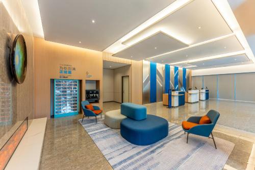 Imagen de los interiores del Hotel Holiday Inn Express Taizhou City Center, an IHG. Foto 20