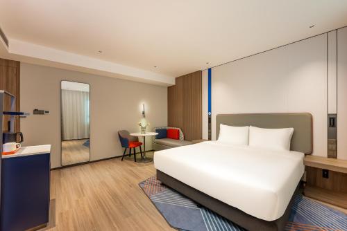 Imagen de la habitación del Hotel Holiday Inn Express Taizhou City Center, an IHG. Foto 18