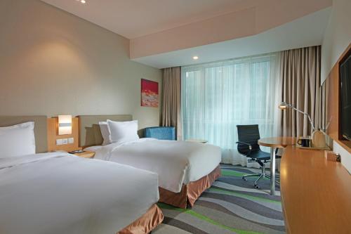 Imagen de la habitación del Hotel Holiday Inn Express Tangshan Downtown. Foto 6
