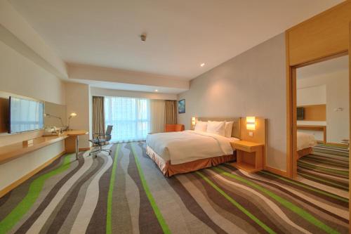 Imagen de la habitación del Hotel Holiday Inn Express Tangshan Downtown. Foto 7
