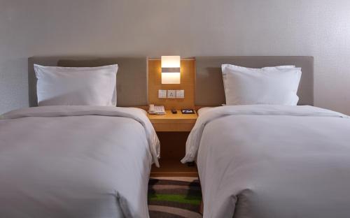 Imagen de la habitación del Hotel Holiday Inn Express Tangshan Downtown. Foto 9