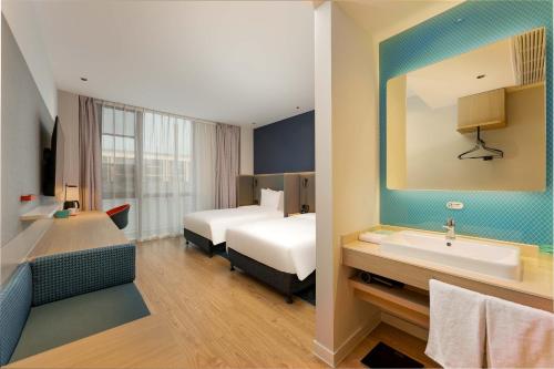 Imagen general del Hotel Holiday Inn Express Wuxi East Station, an IHG. Foto 6