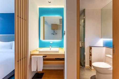 Imagen general del Hotel Holiday Inn Express Wuxi East Station, an IHG. Foto 9