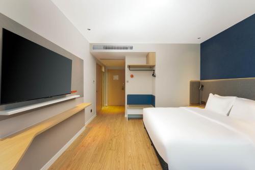 Imagen de la habitación del Hotel Holiday Inn Express Wuxi East Station, an IHG. Foto 16