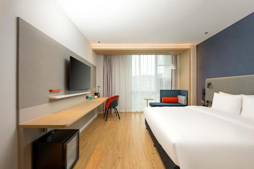 Imagen de la habitación del Hotel Holiday Inn Express Wuxi East Station, an IHG. Foto 17