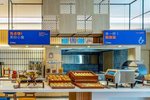 Imagen general del Hotel Holiday Inn Express Wuxi East Station, an IHG. Foto 13