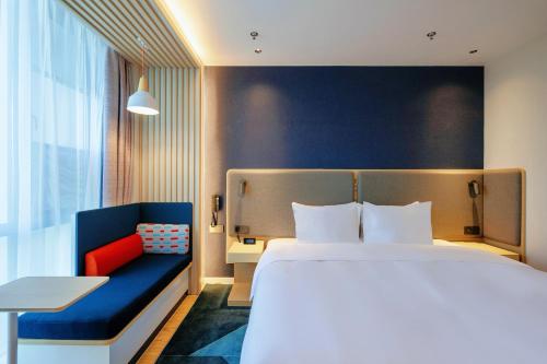 Imagen de la habitación del Hotel Holiday Inn Express Wuxi East Station, an IHG. Foto 20
